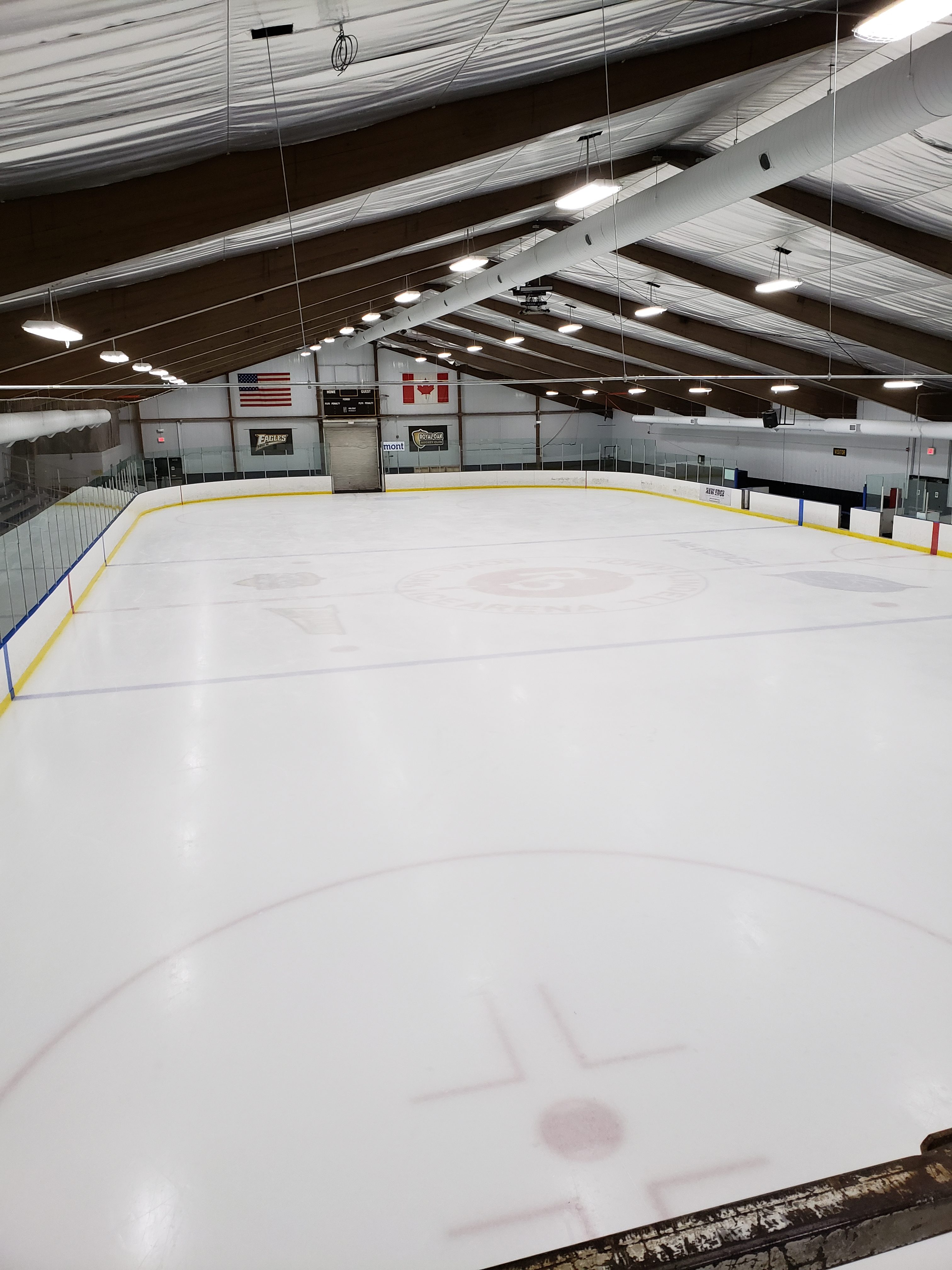 Post LED conversion picture of John Lindell Ice Arena.